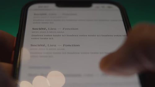 shot of a person looking up your name in a french dictionary