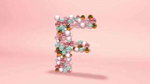 Glossy Spheres Form Letter F Reveal Animation