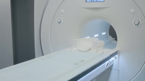 High-Tech MRI Scanner with Patient Table, Circular Tube, Digital Display