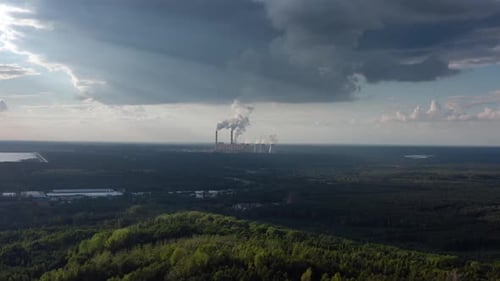 Modern Coal Power Plant With Dramatic Sky - Aerial