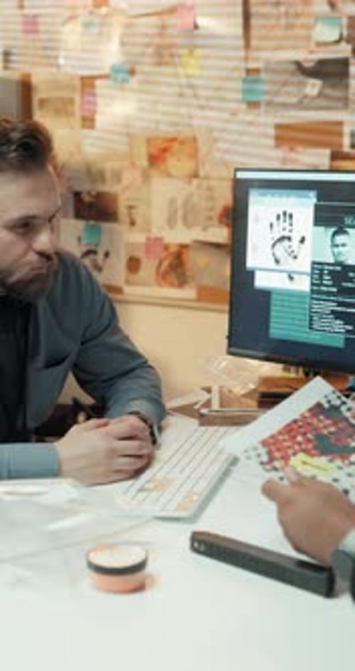 Computer screen, conversation and evidence with detective people in office for problem solving