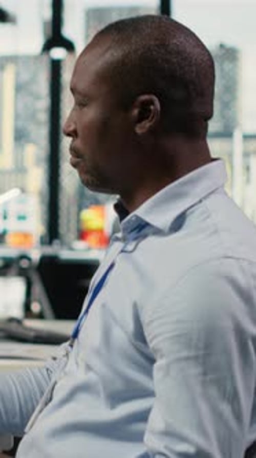 Vertical Video Software Developers in Startup Office Work with Artificial Intelligence