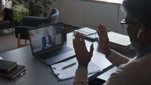 Therapist Speaking by Video Chat at Online Therapy Session