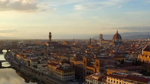Florence, Tuscany, Italy, October 2021. Drone pushes along the Arno river, passing the National Libr