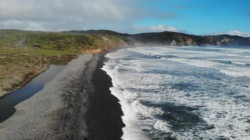 Breathtaking Black Sand Beach Meeting White Ocean Waves