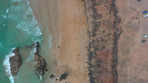 Aerial view of Playa de la Escalera in Fuerteventura on a cloudy day