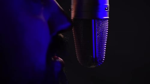 Man With Beard Recording Podcast of Hosting Radio Show, Speaking in Front of Microphone, Close Up