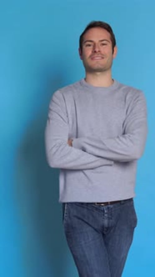 Confident Young Man with Crossed Arms