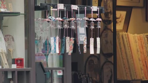 Decorative Japanese Wind Chimes Moved By The Wind In Tokyo, Japan - close up