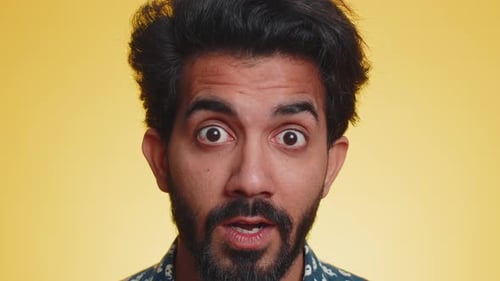 Man Looking Surprised in a Close Up Shot