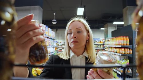 Shoplifting Funny Scene Inside Supermarket Fpootage From Shelf of Caucasian Businesswoman Stealing