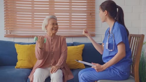 Senior Woman Exercising with a Healthcare Professional