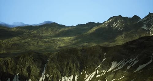 Majestic Mountain Landscape Under Clear Blue Sky with Vibrant Greenery