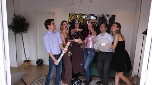 Friends Celebrate with Bubbles and Confetti