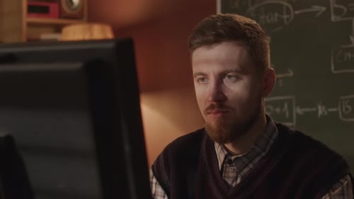 Geek Developing Computer Program at Home