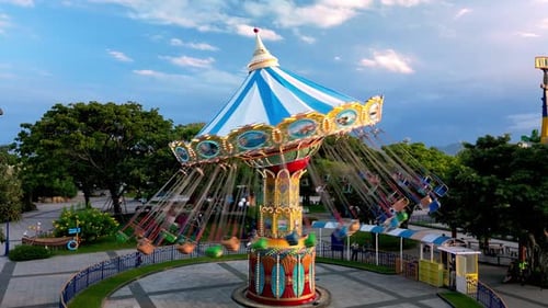 Illuminated Merry Go Round Carousel Filmed at Night in Amusement Park