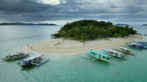 Small Tropical Island Surrounded By Distant Islands