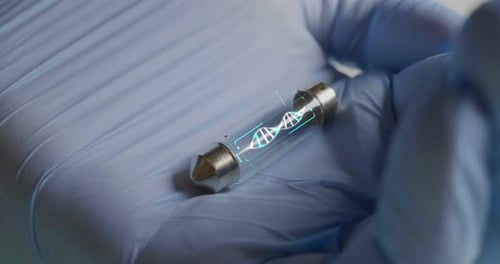 DNA Helix Inside Futuristic Container with Silver Ends