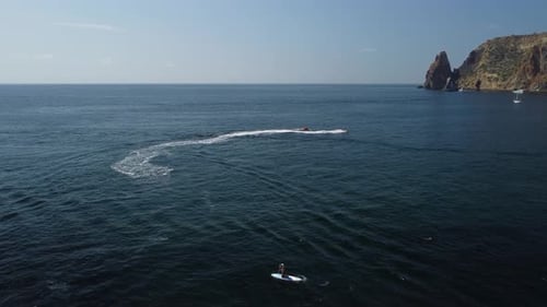 Aerial View of People Swimming and Boating