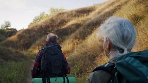 Senior Couple Hiking Together in a Rural Landscape