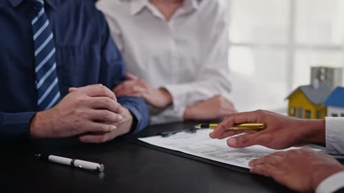 Businesspeople sell buy mortgage and signing agreement for apartment financial