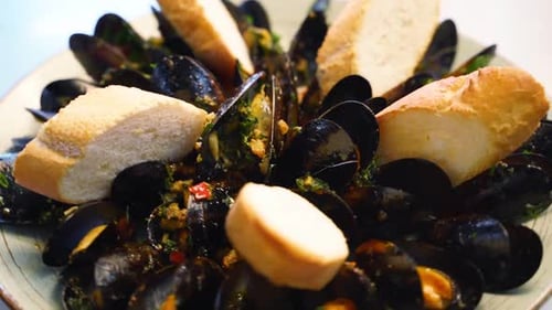 Cooking Delicious Fresh Mussels are Served on a Salver Large Plate for Luxury Restaurant Visitors