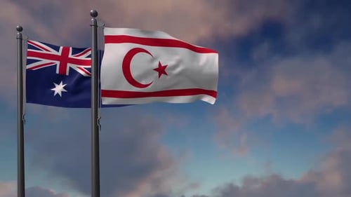 Two Realistic National Flags Waving on Poles Against Blue Sky