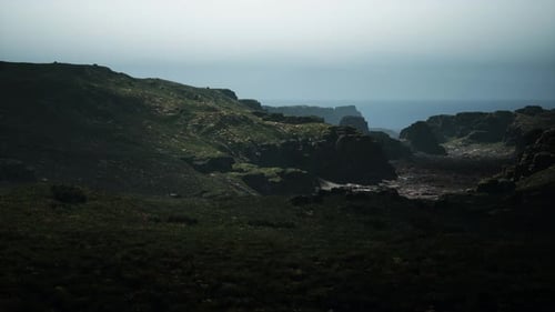 A View of the Ocean From the Top of a Hill Mountain Path