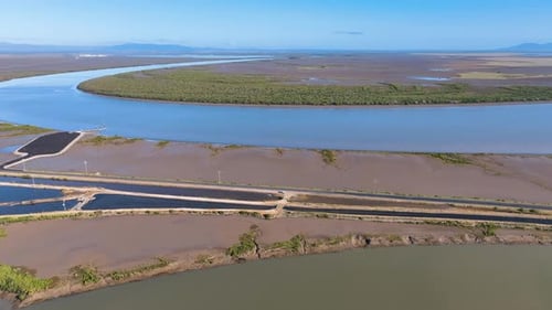 Winding River Flowing Through a Vast Natural Landscape