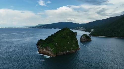 Drone shot around the Mismaloya arches, on the coast of Puerto Vallarta, Mexico