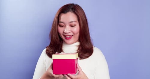 Happy Woman Holds Birthday Gift Box
