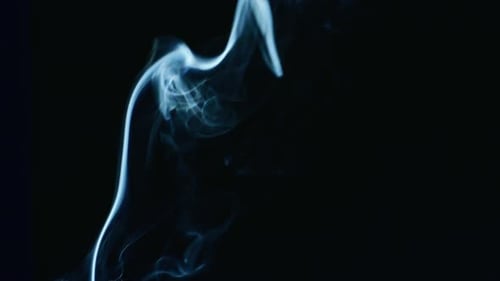 Abstract Blue and White Smoke on Black