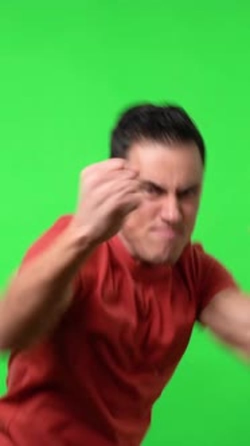 Young Adult Training to Box on Green Screen