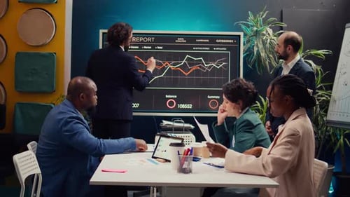 Business Team Analyzing Data in Modern Office