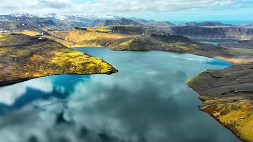 Mountain Lake Picturesque Reflection of Clouds in Clear Glacial Water Scenic Aerial Landscape in