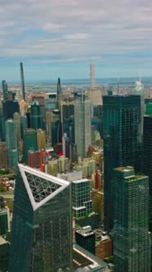 Stunning view of the modern architecture of New York. Mirror skyscrapers towering over the city.