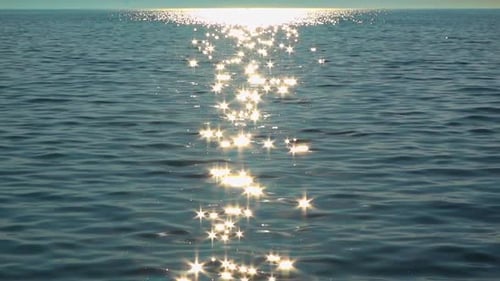 Sun Sparkle Stars Over On Blue Sea Water