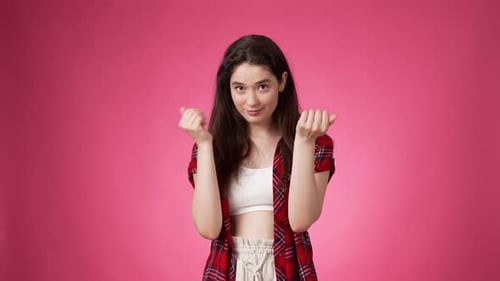Young Woman Gesturing with Hands and Arms