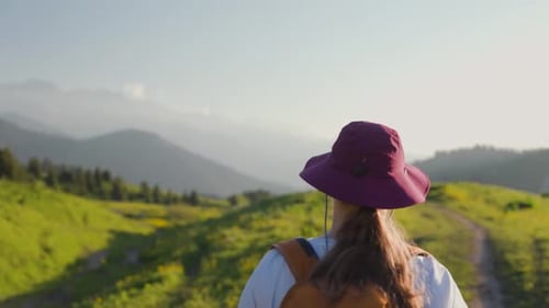 Woman Hiker in the Forest Mountain