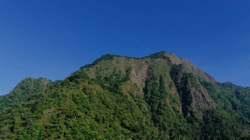 Aerial footage of forest mountain with beautiful morning sky