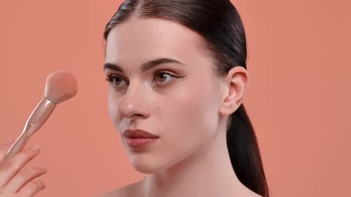 Applying Makeup with Precision Using Brush and Powder
