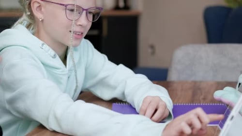 Online School Class Siblings Pupils Boy and Girl Learning Together Remotely Online at Home Looking
