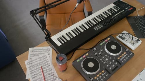 Music Setup with Keyboard, Mixer and Laptop