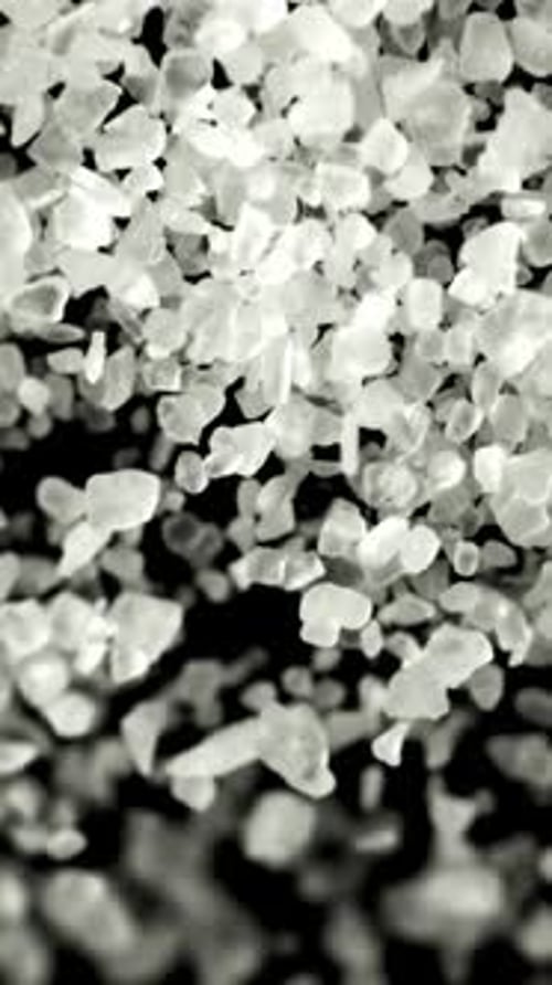 Salt Flies Up and Falls Down View From Above Filmed on a Highspeed Camera at 1000 Fps
