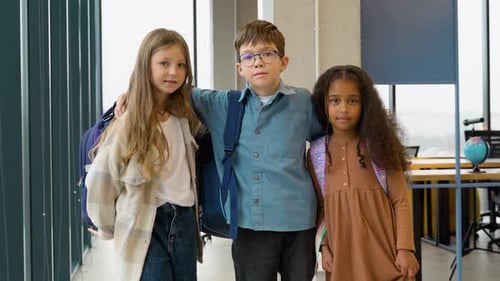 Happy Successful Diverse School Students Together in Classroom