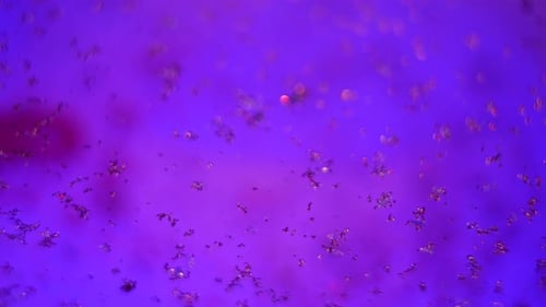 Abstract Purple Glitter Particles Shimmering Background