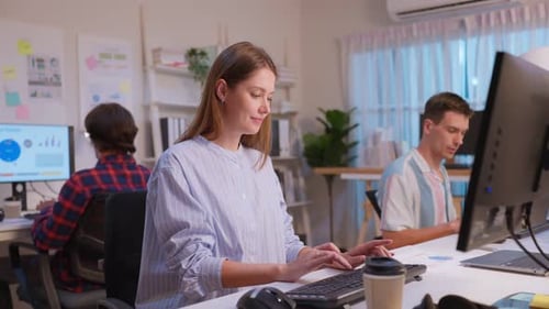 Group of businessman and woman using laptop computer working in office.