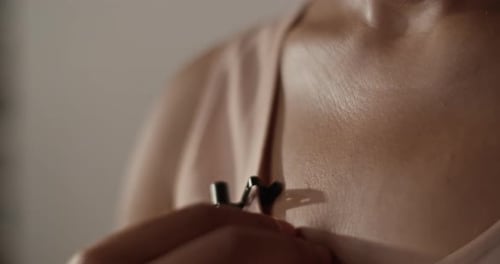 Anonymous Vlogger Preparing Microphone for Stream