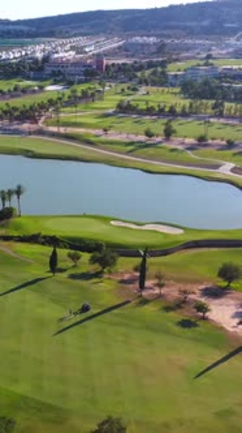 Wide Aerial View of a Luxury Green Golf Course
