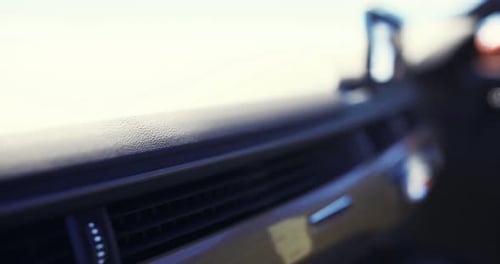 Close Up View of Car Interior Detailing at Sunset